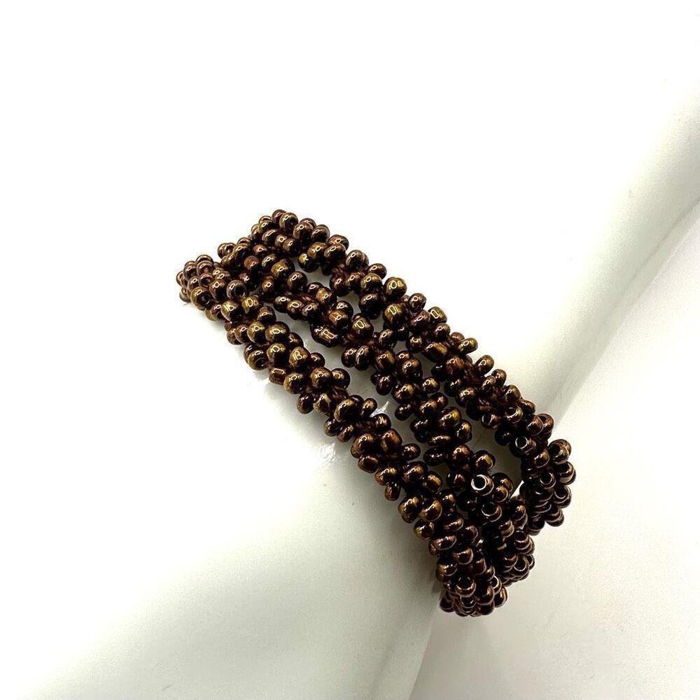 Gold tone multi strand beaded bracelet